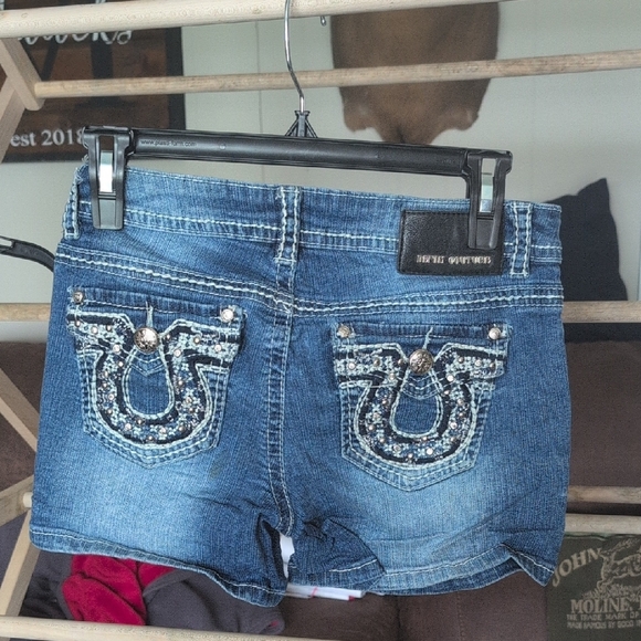 Distressed Blue Jean Shorts with Cut-Off Hem - Picture 3 of 3